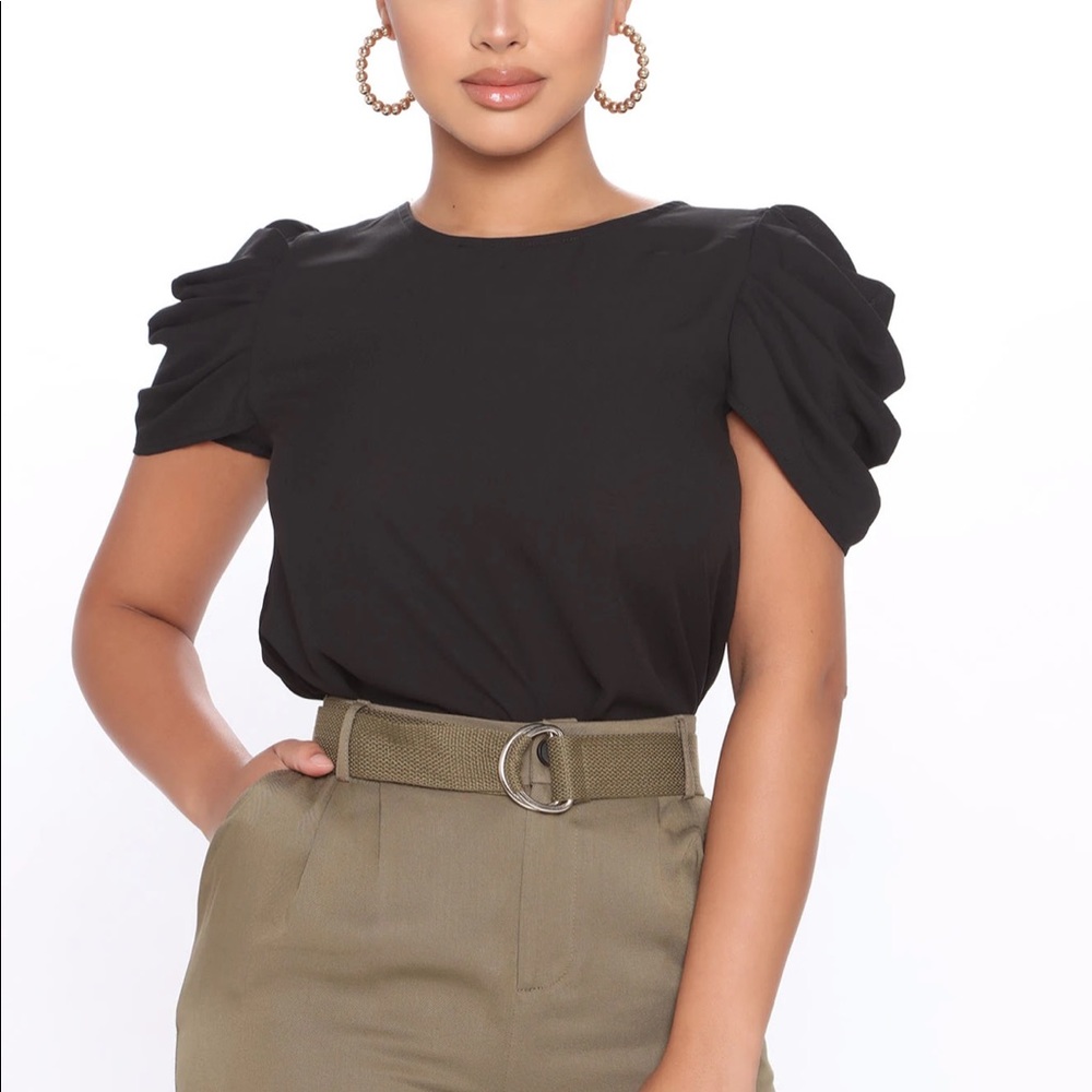 Puff/ ruffle sleeve black blouse. Dressy top new never worn.